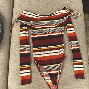 Different color body suit